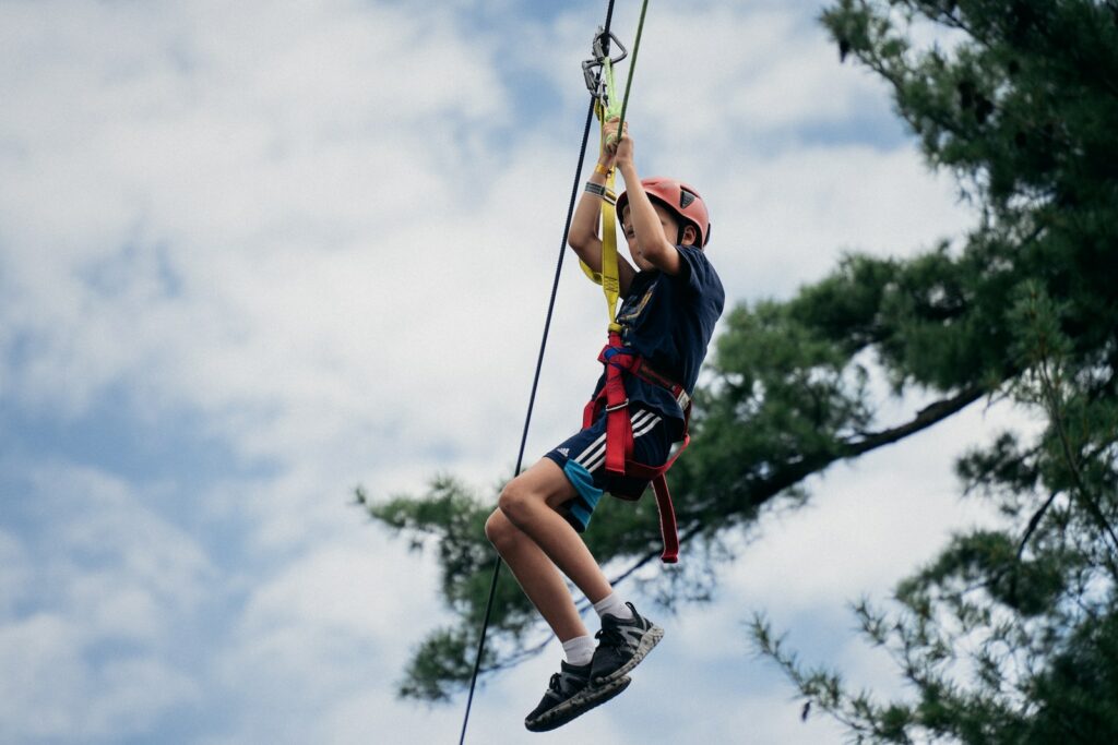 a man on a zip line